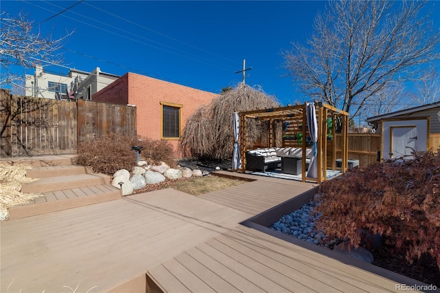 deck with fence and an outdoor living space