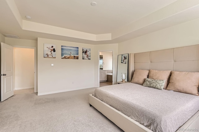 3162 Grizzly Peak Dr, Broomfield, CO 80023 - bedroom with a tray ceiling, light colored carpet, and baseboards