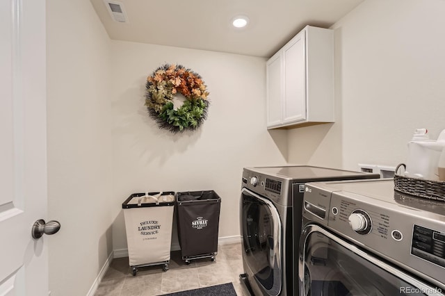 3162 Grizzly Peak Dr, Broomfield, CO 80023 - laundry room featuring cabinet space, independent washer and dryer, and baseboards