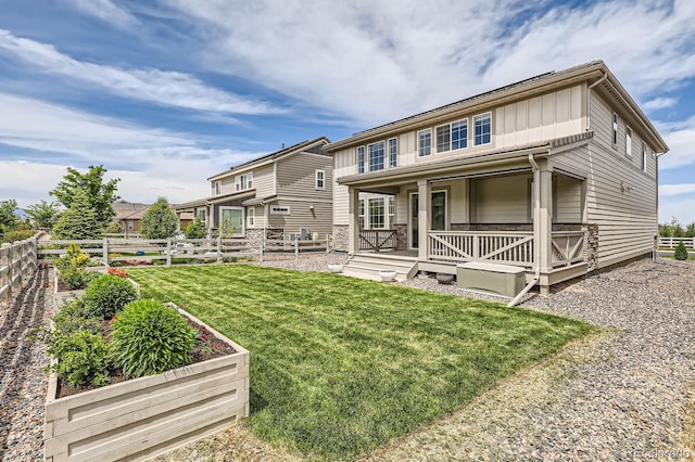 3162 Grizzly Peak Dr, Broomfield, CO 80023 - rear view of property with a porch and board and batten siding