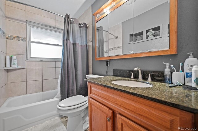 3010 Fireweed Dr, Colorado Springs, CO 80918 - full bath featuring vanity, shower / bathtub combination with curtain, and toilet