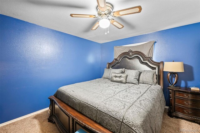 3010 Fireweed Dr, Colorado Springs, CO 80918 - bedroom featuring carpet, baseboards, ceiling fan, and a textured wall