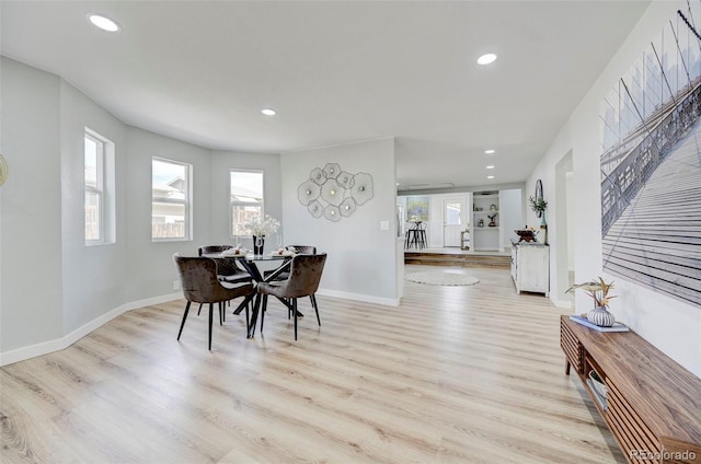 dining room with light wood-type flooring