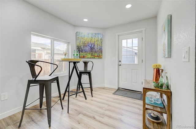 entrance foyer featuring a healthy amount of sunlight and light hardwood / wood-style floors