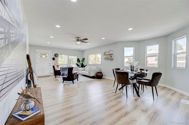 dining area featuring ceiling fan and light hardwood / wood-style floors