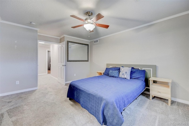 bedroom featuring carpet flooring, ornamental molding, baseboards, and a ceiling fan
