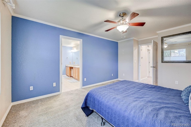 carpeted bedroom with ornamental molding, ceiling fan, connected bathroom, and baseboards