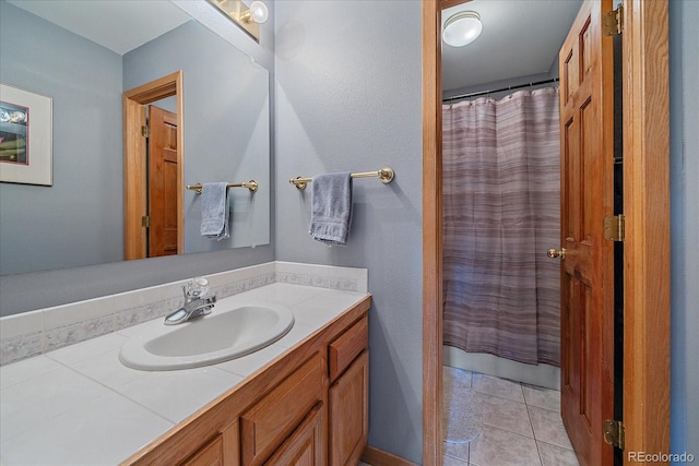11222 Conifer Mountain Rd, Conifer, CO 80433 - full bathroom featuring vanity, a shower with shower curtain, and tile patterned flooring