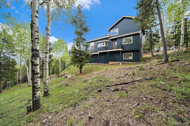11222 Conifer Mountain Rd, Conifer, CO 80433 - back of house with a wooden deck