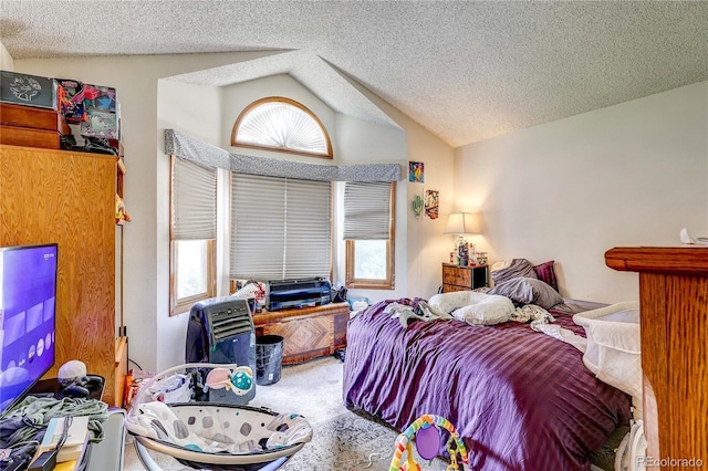 5185 E Weaver Dr, Centennial, CO 80121 - carpeted bedroom with lofted ceiling, multiple windows, and a textured ceiling