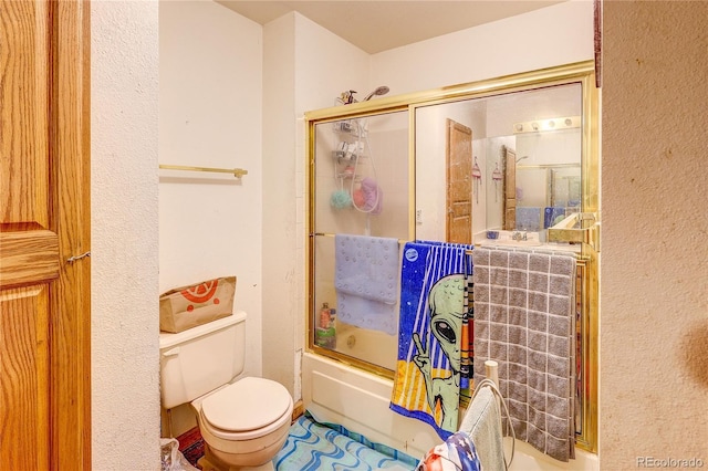5185 E Weaver Dr, Centennial, CO 80121 - full bath featuring bath / shower combo with glass door and a textured wall