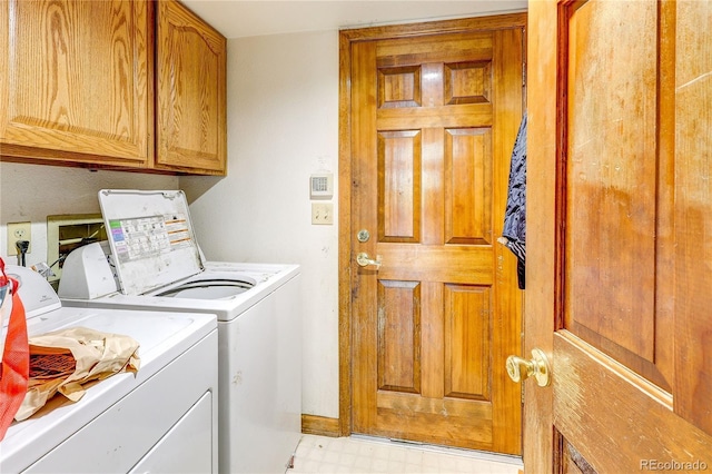 5185 E Weaver Dr, Centennial, CO 80121 - washroom featuring separate washer and dryer, cabinet space, and light floors