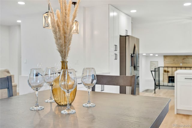 dining space featuring light hardwood / wood-style flooring