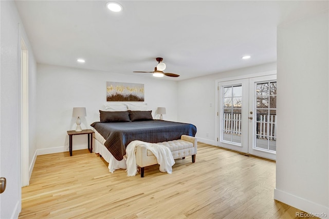 bedroom featuring ceiling fan, light hardwood / wood-style floors, access to outside, and french doors