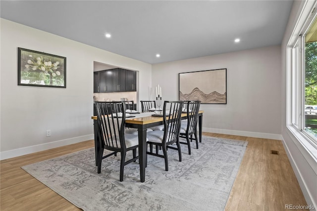 34 Honey Locust, Littleton, CO 80127 - dining room with light wood-style flooring, healthy amount of natural light, and recessed lighting
