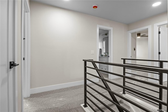 34 Honey Locust, Littleton, CO 80127 - hallway with an upstairs landing, carpet flooring, and recessed lighting