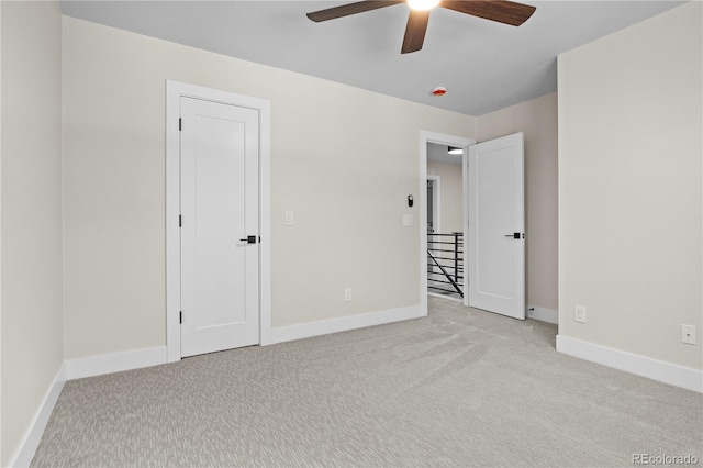 34 Honey Locust, Littleton, CO 80127 - unfurnished bedroom with light carpet and a ceiling fan