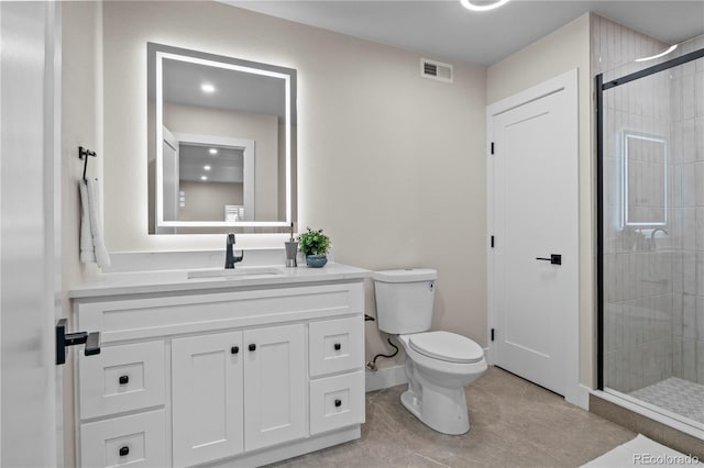 34 Honey Locust, Littleton, CO 80127 - bathroom with a stall shower, vanity, and tile patterned floors