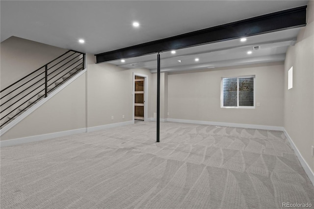 34 Honey Locust, Littleton, CO 80127 - below grade area featuring light colored carpet, recessed lighting, and stairway