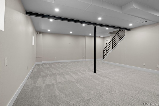 34 Honey Locust, Littleton, CO 80127 - finished basement featuring light colored carpet, recessed lighting, and stairs