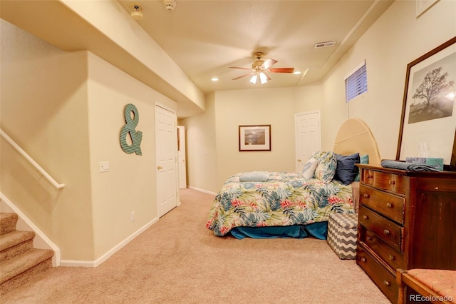 carpeted bedroom with ceiling fan