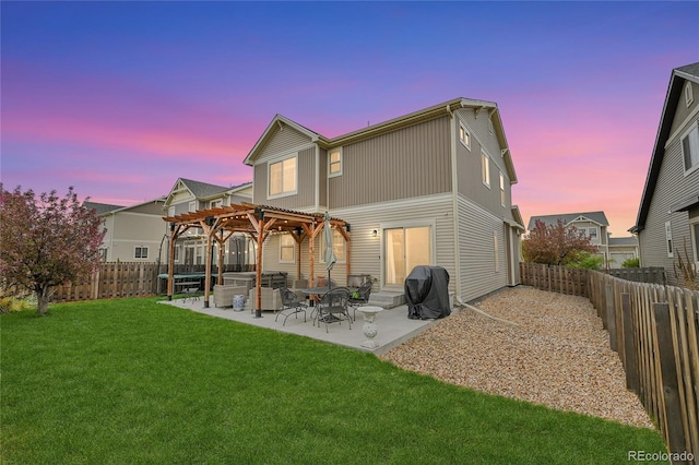 12873 E 108th Ave, Commerce City, CO 80022 - back of house featuring a yard, a pergola, a patio, and a fenced backyard