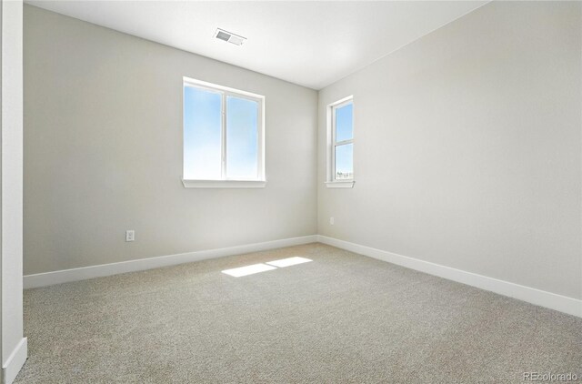 1672 Fox Trotter Pt, Castle Rock, CO 80104 - carpeted empty room with baseboards