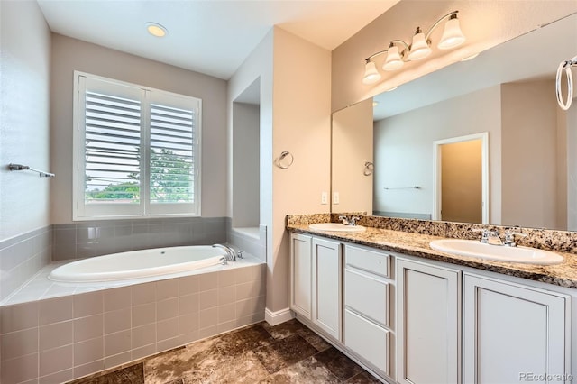 606 E Dry Creek Pl, Littleton, CO 80122 - full bathroom with double vanity and a garden tub