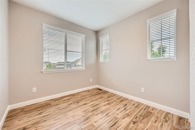 606 E Dry Creek Pl, Littleton, CO 80122 - spare room with wood finished floors