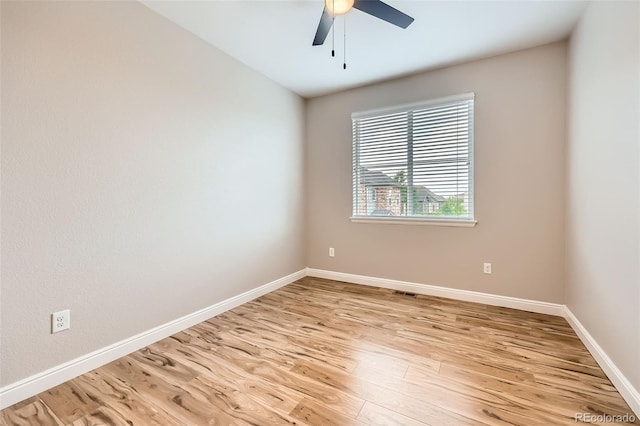 606 E Dry Creek Pl, Littleton, CO 80122 - empty room with light wood finished floors and a ceiling fan