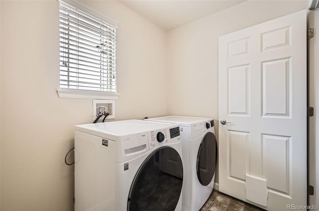 clothes washing area with laundry area and washing machine and clothes dryer