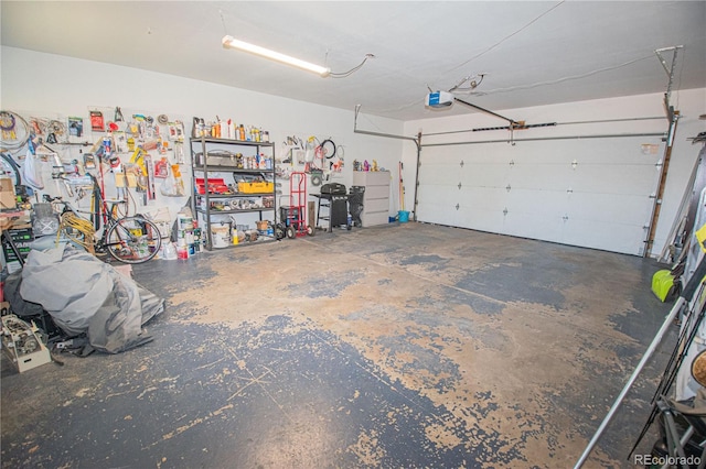 garage featuring a garage door opener