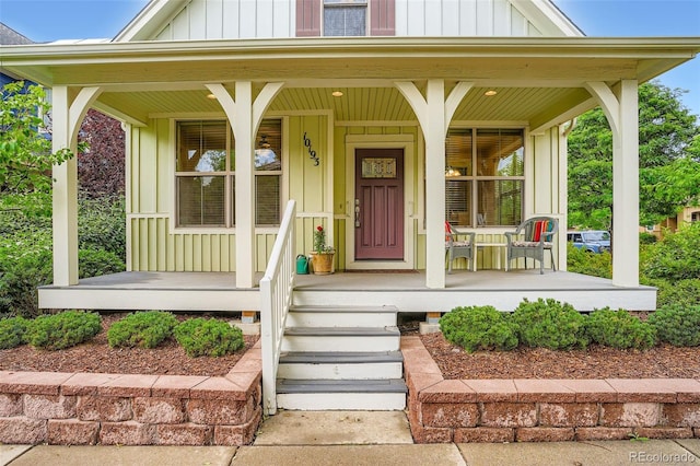 10193 E 29th Ave, Denver, CO 80238 - view of front of house with board and batten siding and a porch