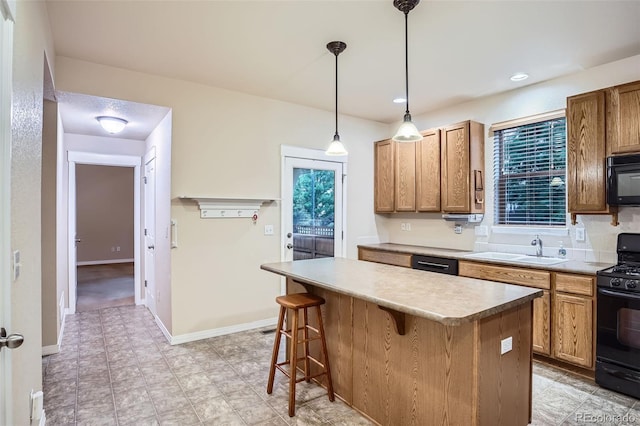 10193 E 29th Ave, Denver, CO 80238 - kitchen featuring black appliances, a kitchen breakfast bar, plenty of natural light, a kitchen island, and recessed lighting