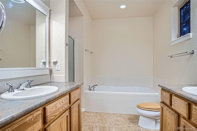 10193 E 29th Ave, Denver, CO 80238 - full bath featuring vanity, a bath, a shower stall, and tile patterned floors