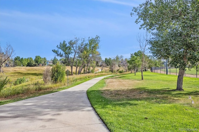 surrounding community featuring a yard