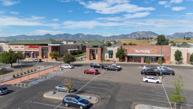 view of building exterior featuring a mountain view