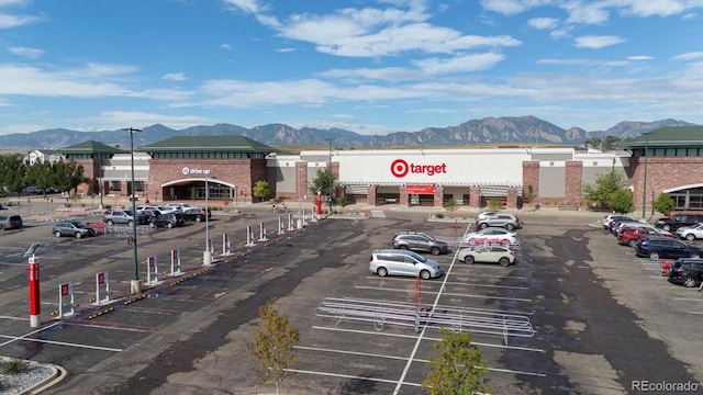 882 Eldorado Dr, Superior, CO 80027 - view of commercial property with a mountain view and uncovered parking