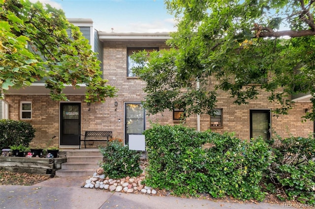 8787 W Cornell Ave Unit 6, Lakewood, CO 80227 - view of front of house featuring brick siding