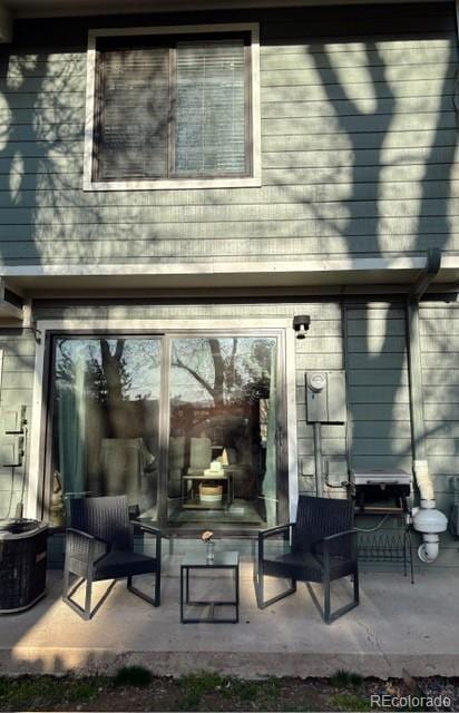 8787 W Cornell Ave Unit 6, Lakewood, CO 80227 - rear view of house featuring central AC unit
