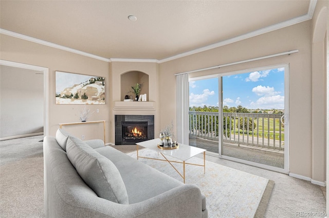 carpeted living room with a tile fireplace and ornamental molding