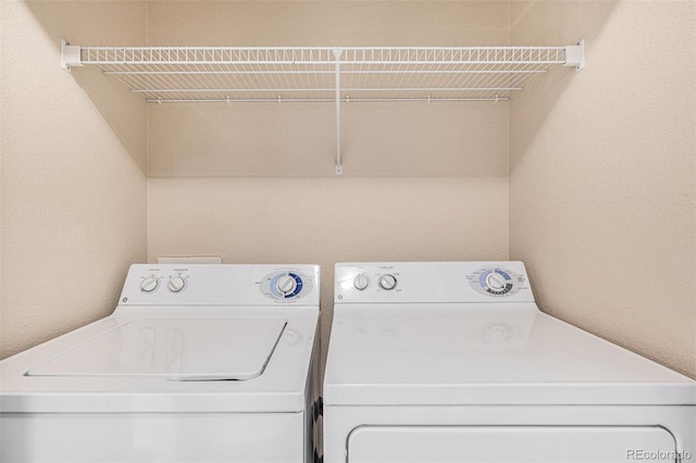 laundry room featuring washer and dryer