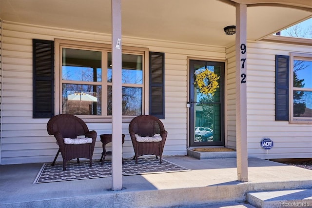 doorway to property with covered porch