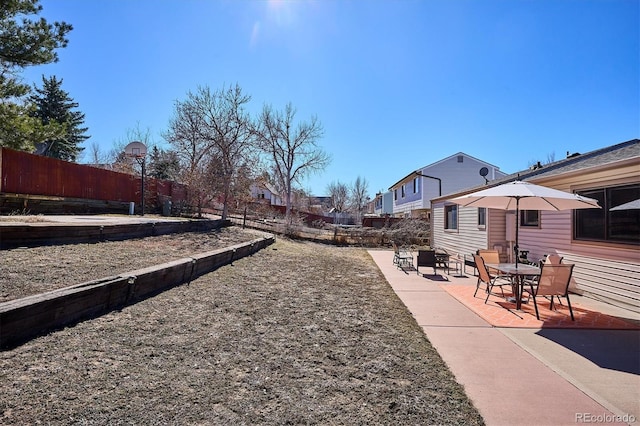 view of yard featuring a fenced backyard and a patio