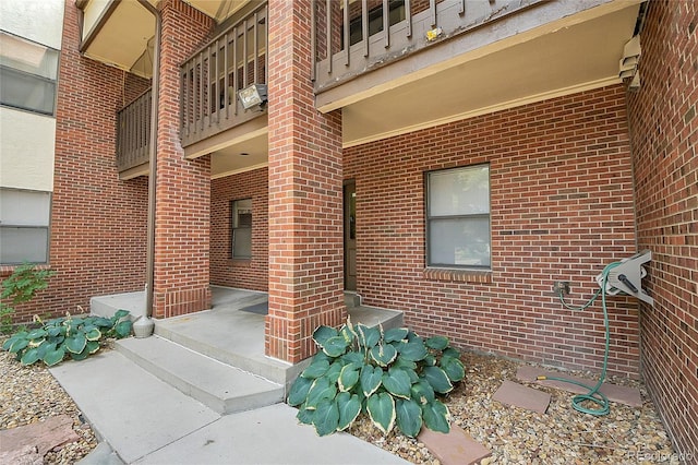 doorway to property with a balcony