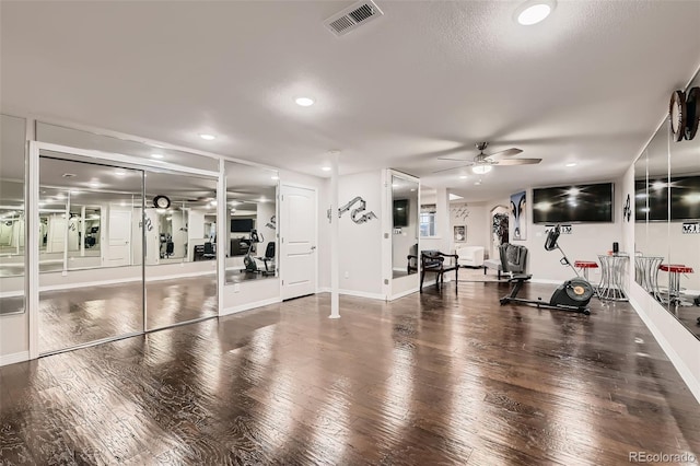 7851 E 148th Dr, Thornton, CO 80602 - gym featuring a ceiling fan, baseboards, recessed lighting, wood finished floors, and visible vents