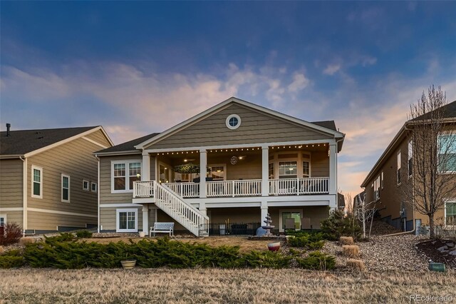 7851 E 148th Dr, Thornton, CO 80602 - back of property at dusk with stairway