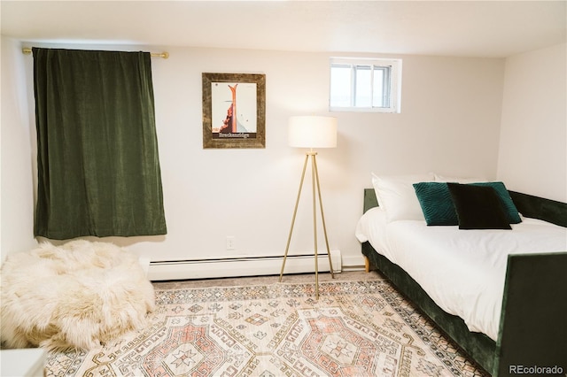 bedroom with baseboards and baseboard heating