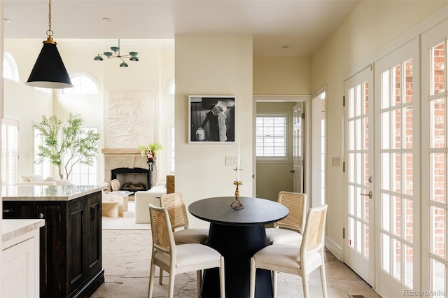5700 S Steele St, Greenwood Village, CO 80121 - dining space with a fireplace
