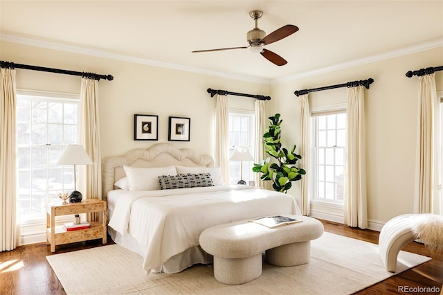 5700 S Steele St, Greenwood Village, CO 80121 - bedroom with wood finished floors, crown molding, and a ceiling fan